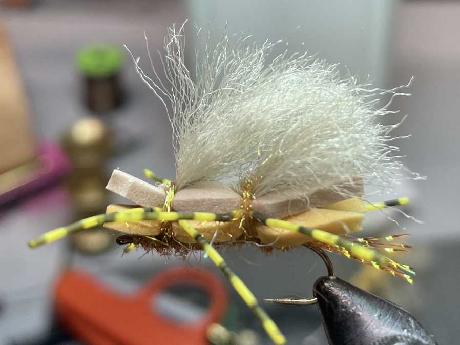 Hares ear parachute dry fly barbless hook. Low priced Uk trout flies..